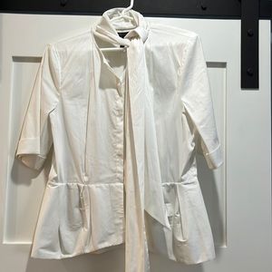 BCBG white peplum cotton blouse with tie neck size L